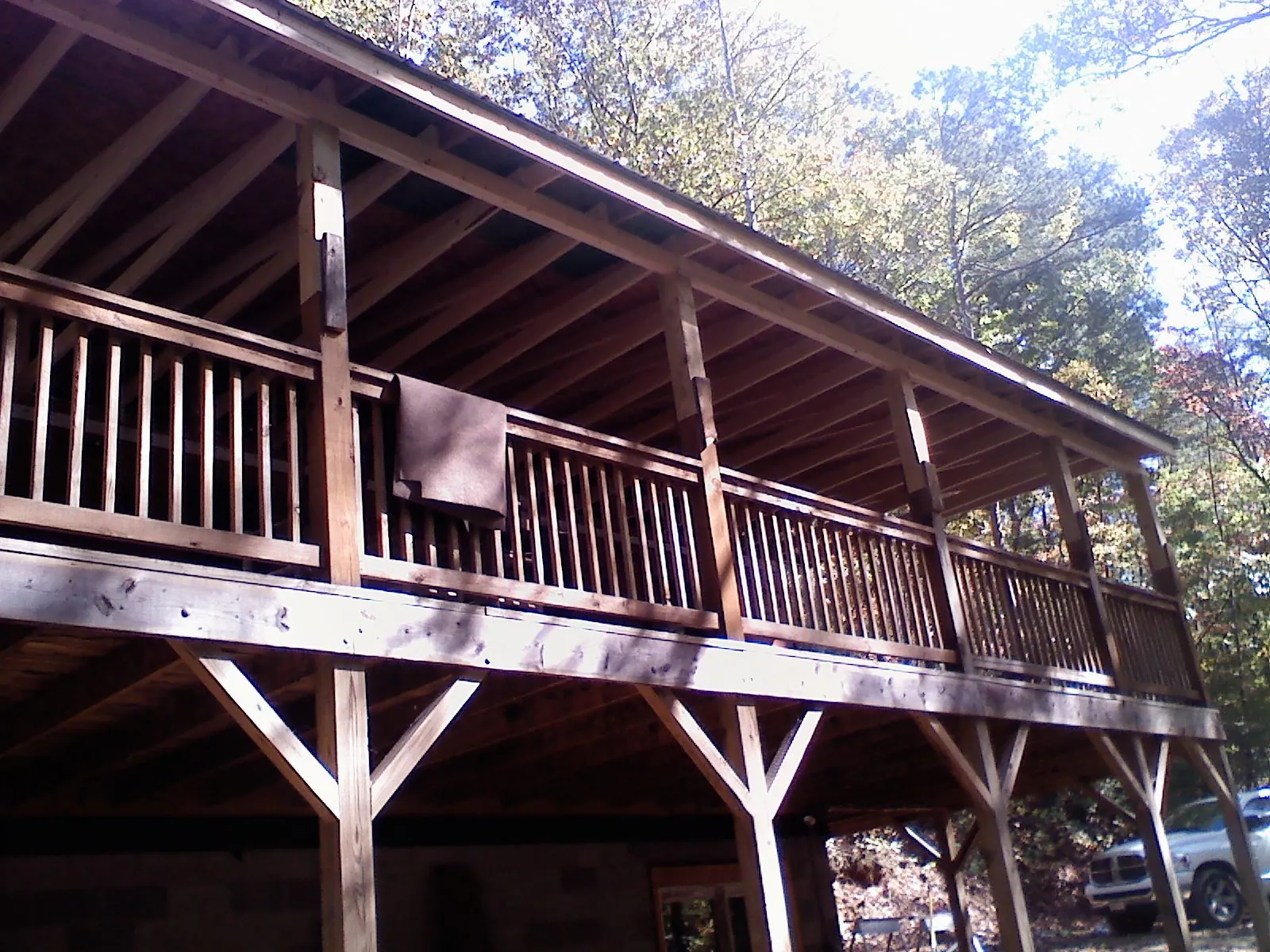 Timber framing under a new elevated porch and deck — Roof Leak Repair in Calera by Roofing Brothers